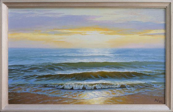 SUNRISE ABOVE THE WAVES