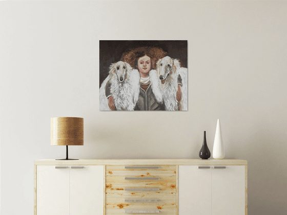 Girl with borzoi dogs