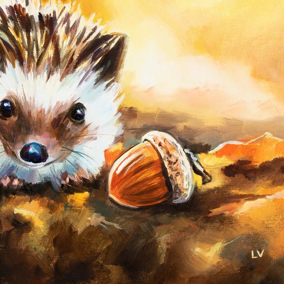 Hedgehog with acorn in fall