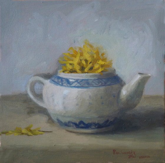 Teapot with yellow flowers