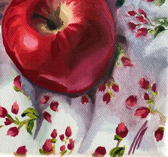 Apples on a floral background