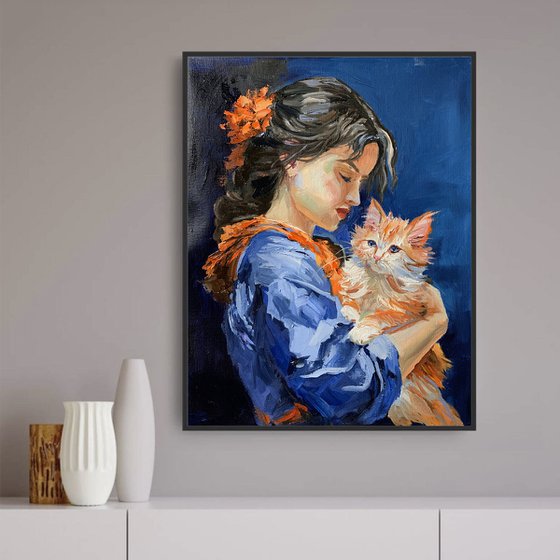 Girl in blue dress, orange cat