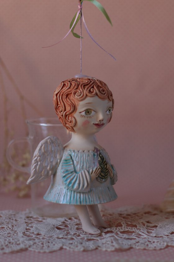 Tiny hanging sculpture. Angel