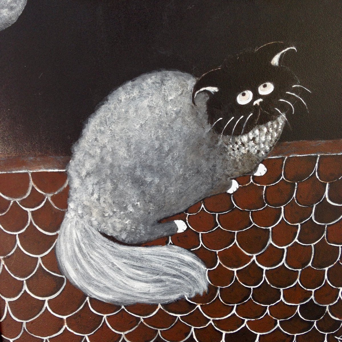 Grey cat on a roof by Eleanor Gabriel