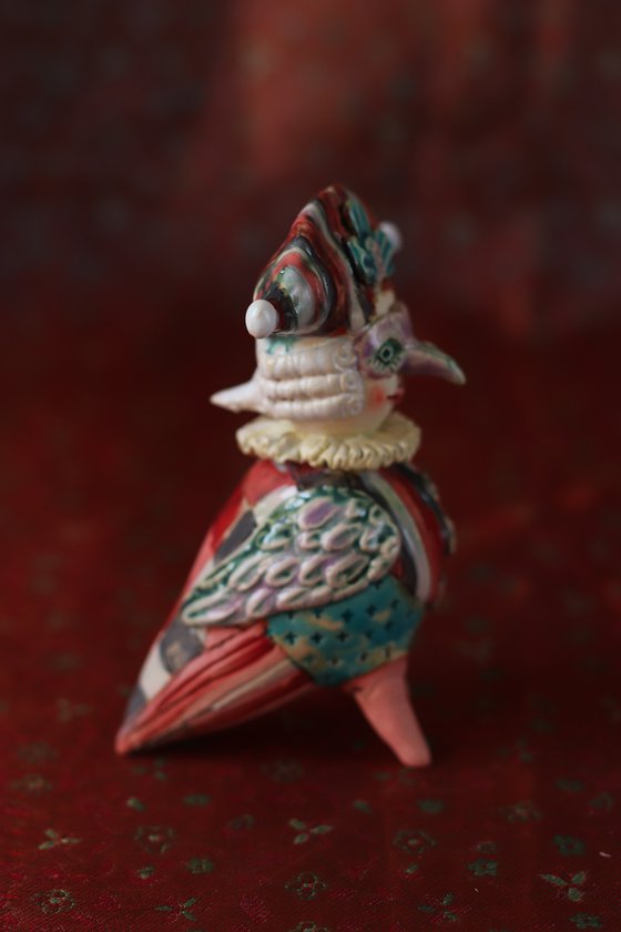 Harlequin Bird. Ceramic sculpture.