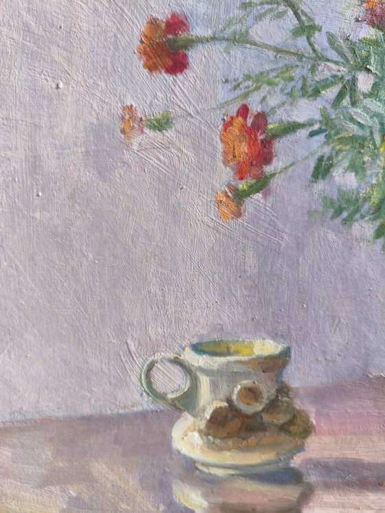 Marigolds in a clay pot