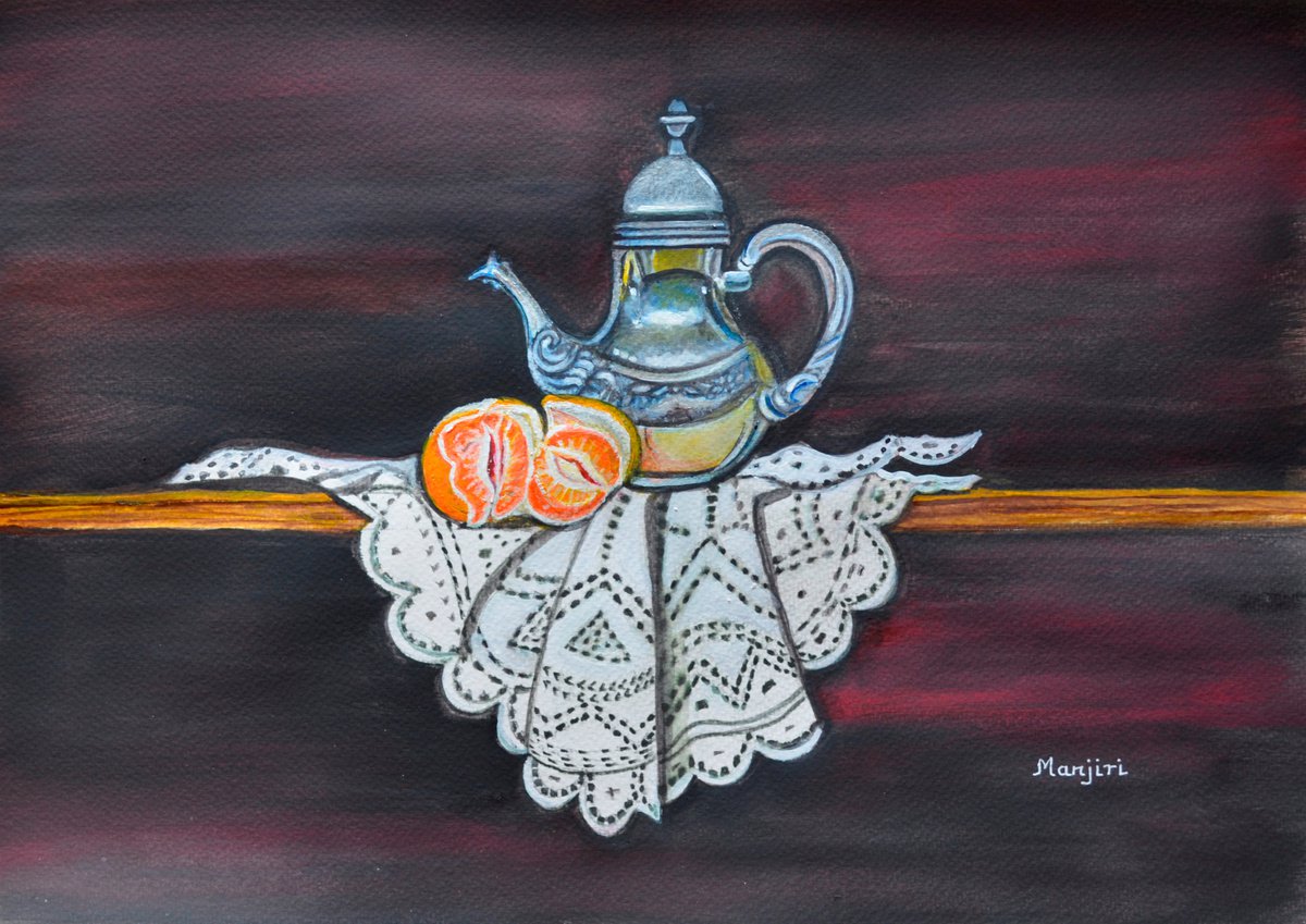 Still life with orange and teapot on lace by Manjiri Kanvinde