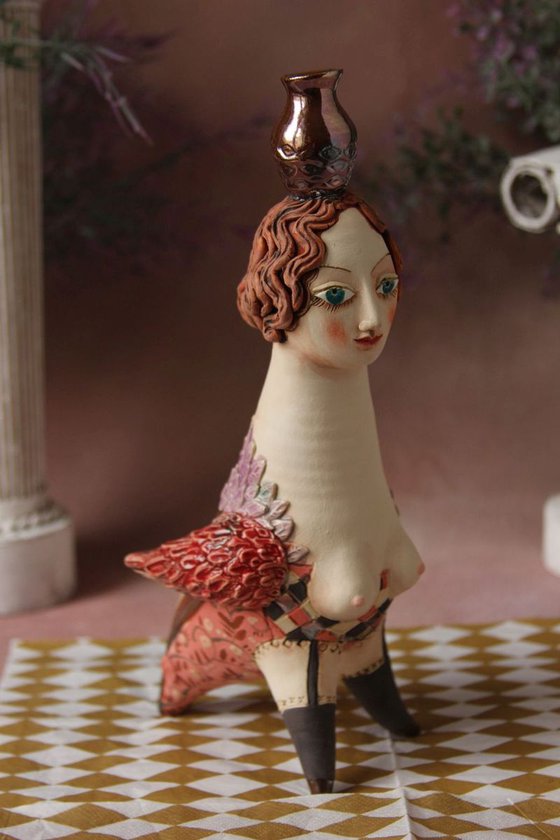 Bird Women with a jug. Ceramic sculpture