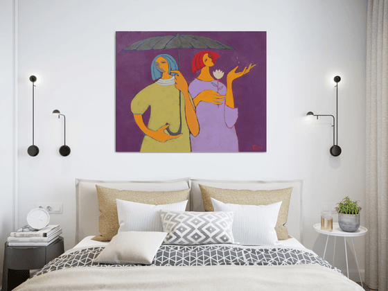 Two under an umbrella.