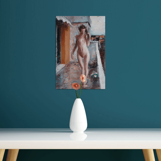 Young girl on the balcony