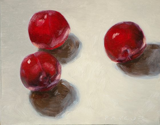 three young plums