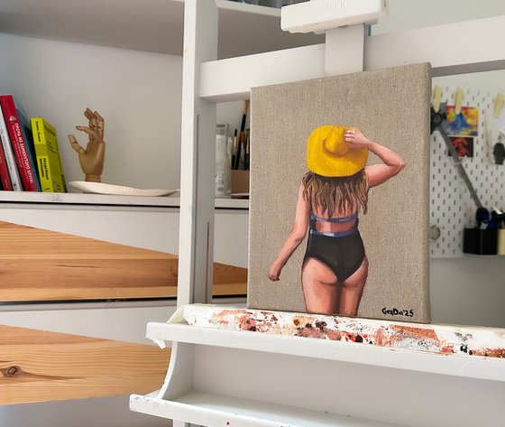 Girl in the yellow sun hat