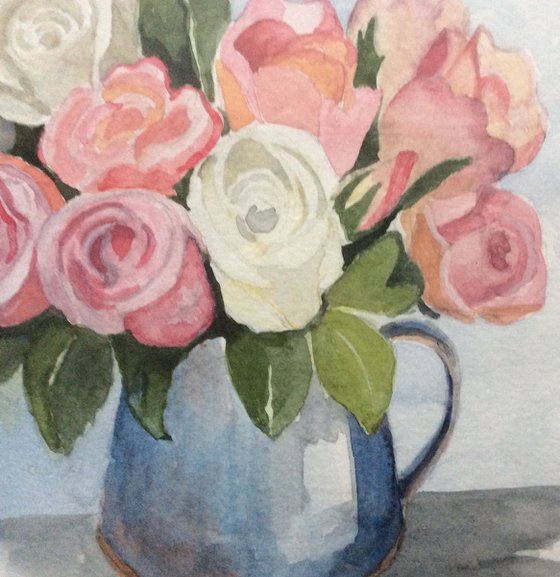 Roses in blue jug