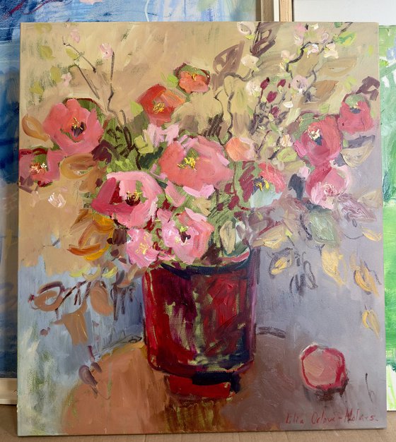 Flowers in a red vase