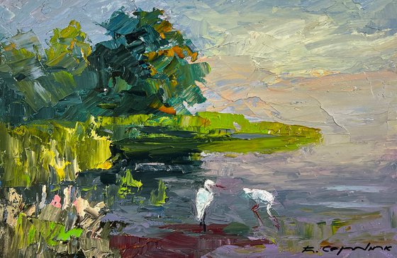 Storks by the Pond
