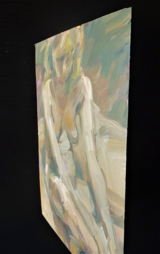 Nude. Seated