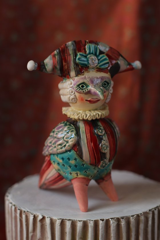 Harlequin Bird. Ceramic sculpture.