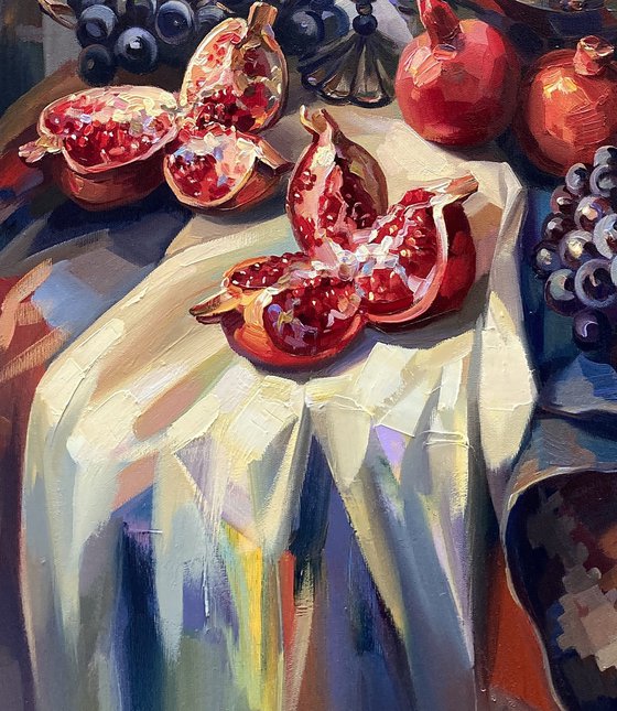 Pomegranates and candles