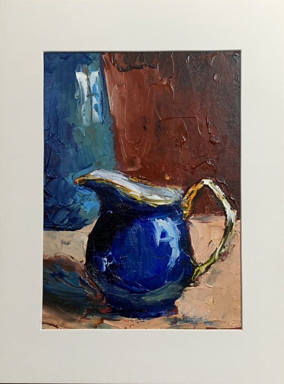 Cobalt milk pitcher.