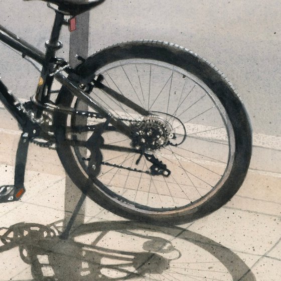 Shadow of a Bicycle on the Pavement