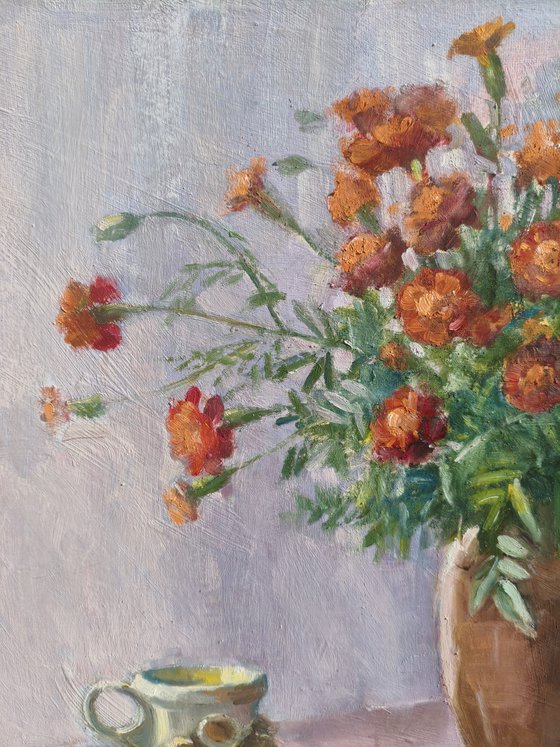 Marigolds in a clay pot