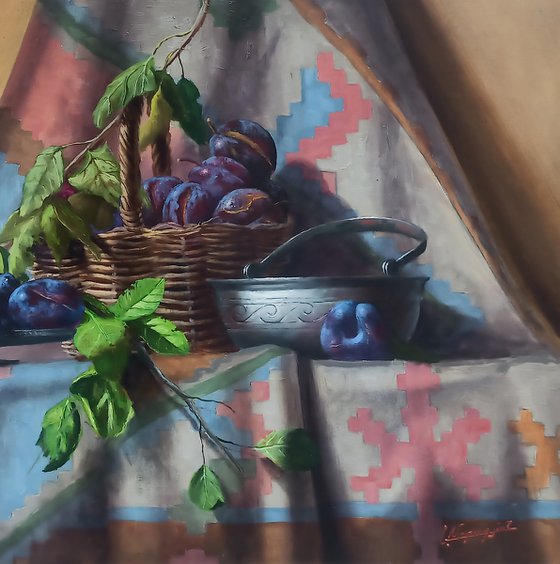 Still life with plums and grapes