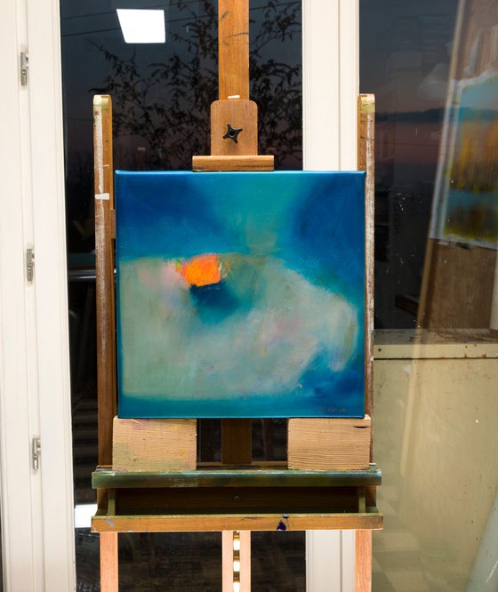 The orange on the blue table