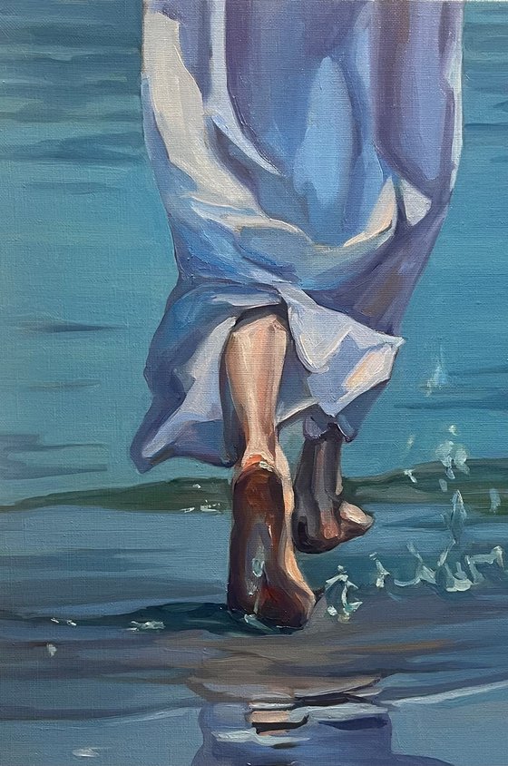 Woman running to the sea