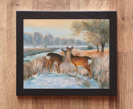 Snowy landscape with deer