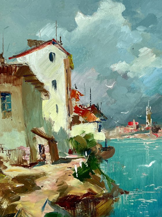 Two Boats at a Coastal House