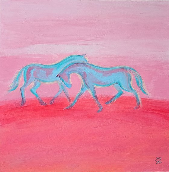 White blue horses at soft pink sunset