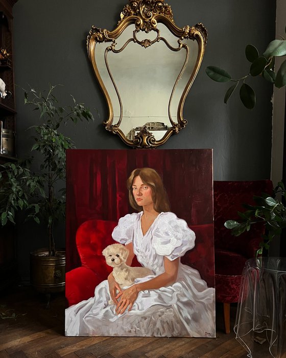 Portrait of a woman with maltese dog