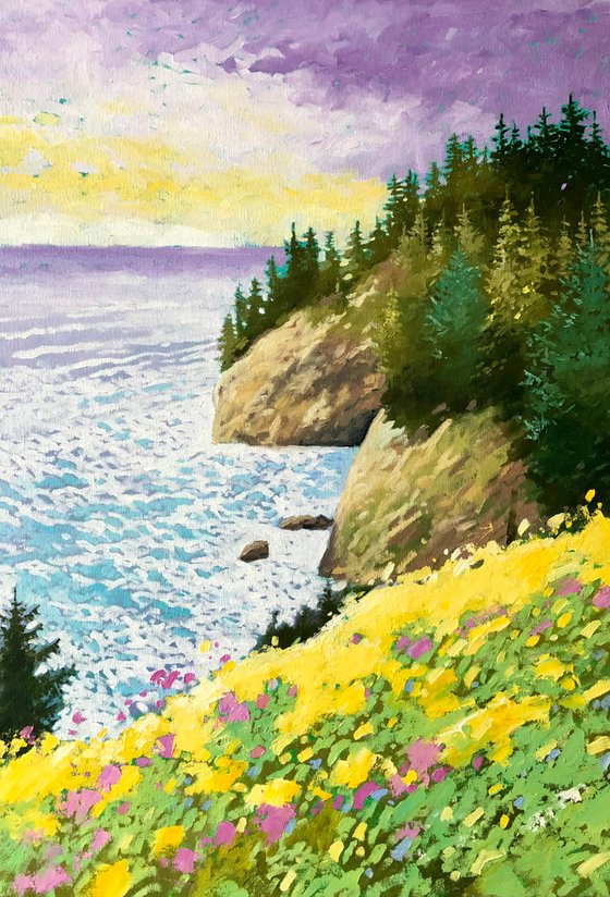 Rocky coastline with yellow flowers