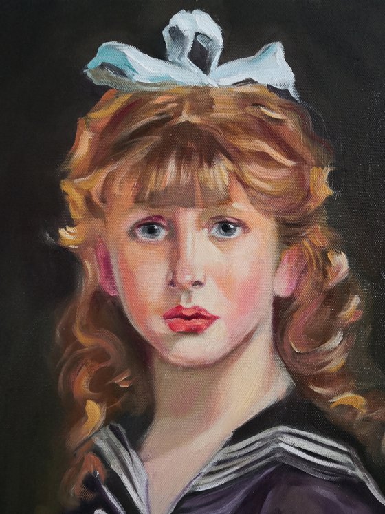 Portrait of a little girl with bow in her hair