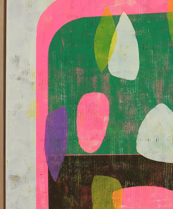 Fractured neon pink in green