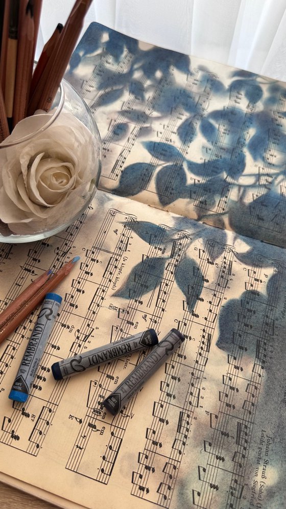 Leaf Silhouette Pastel on Vintage Sheet Music