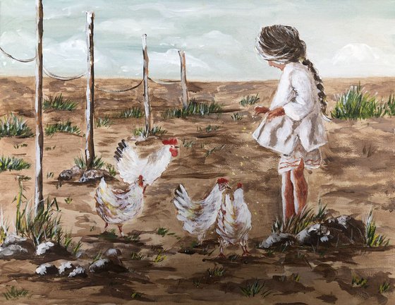 Girl feeding chickens