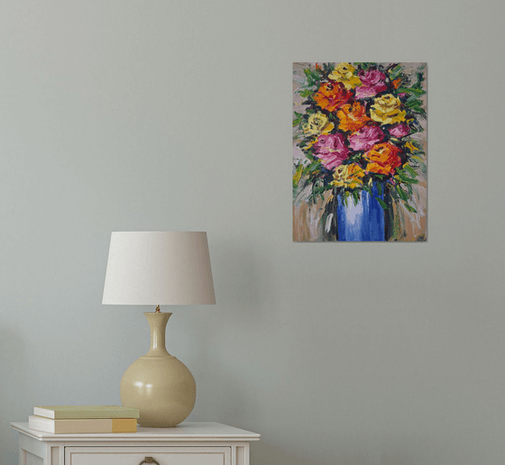 Roses in a blue vase