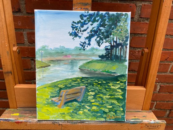 Sunny day at the lake in the park. Pleinair