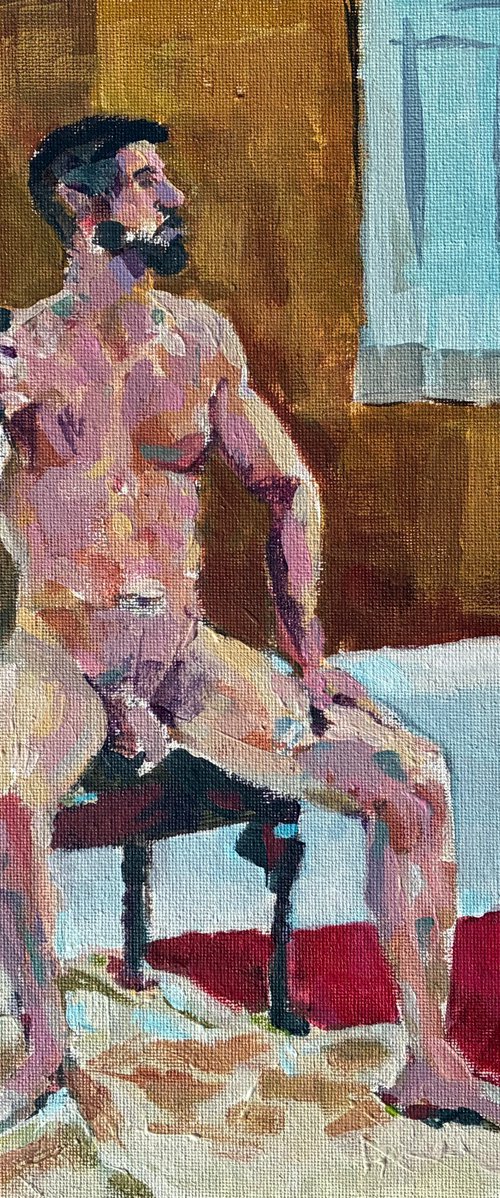 Male model sitting by Paul Gurney