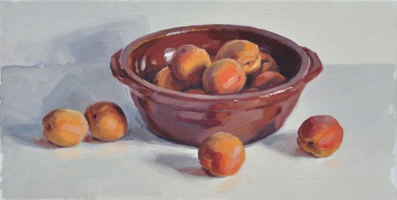Apricots in an earthenware dish