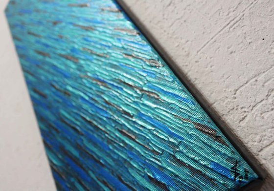 Iridescent gray blue knife texture