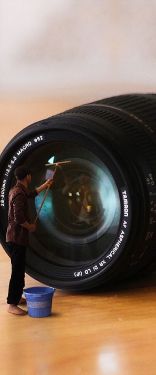 Cleaning the Lens by Achraf Baznani