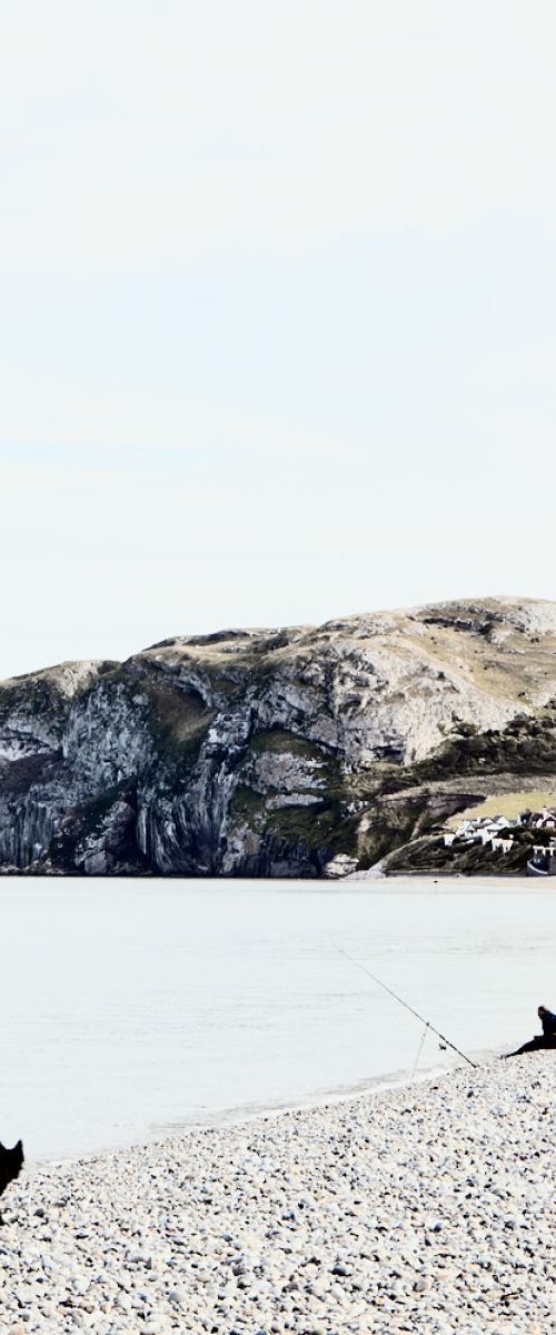 Dog walker & fisherman at Llandudno by Steve Deer