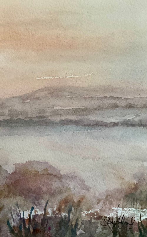 Isle of Purbeck hills from Arne across the estuary, Dorset. by Samantha Adams