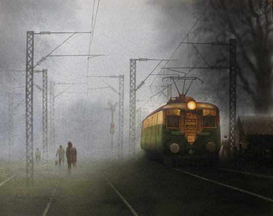 train in foggy morning