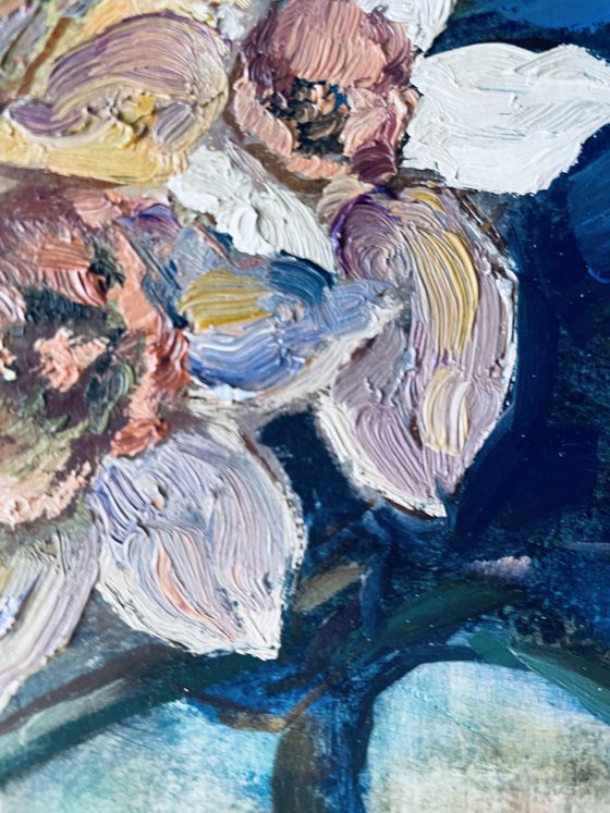 Daffodils in a blue vase