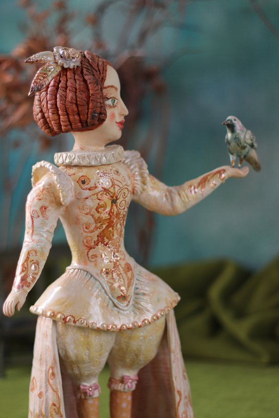Adventures in the Magic Garden. Girl with a bird.