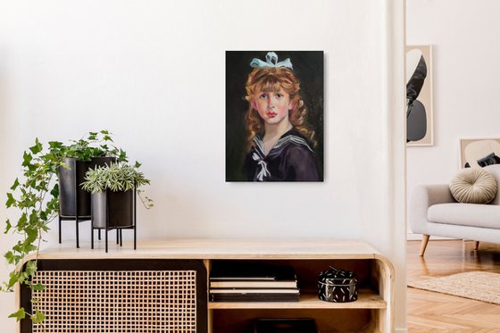 Portrait of a little girl with bow in her hair