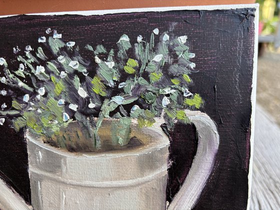 Watering can still life